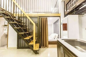 Familien-Zweibettzimmer | Wohnbereich | Flachbildfernseher