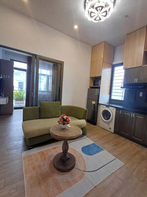 Premium-Apartment | Wohnbereich | Flachbildfernseher