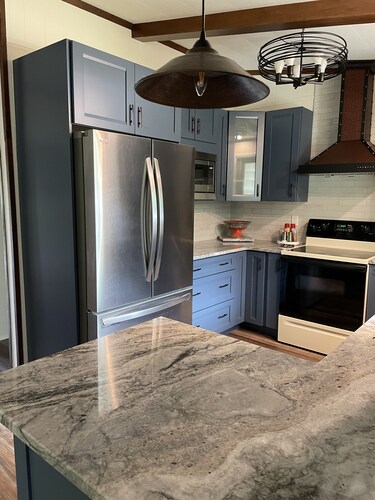 Treetop views from every window. sleeps 8, 4 bedrooms 2 full baths.