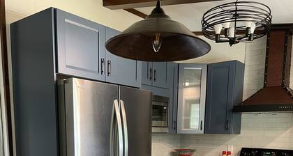 Treetop views from every window. sleeps 8, 4 bedrooms 2 full baths.