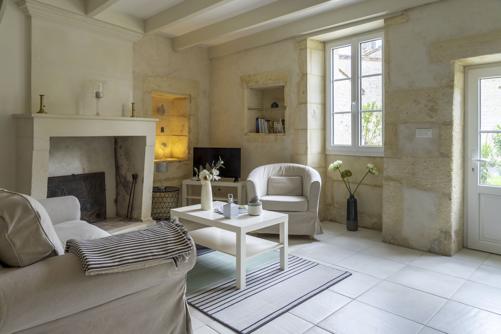 TV, fireplace, books