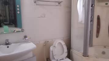 Shower, free toiletries, hair dryer, slippers