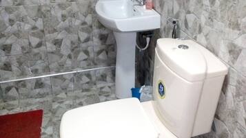 Shower, rainfall showerhead, towels