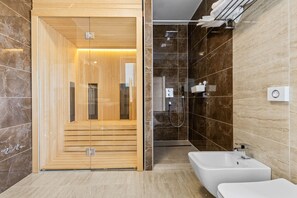 Bathtub, hair dryer, towels