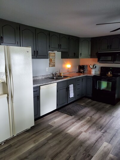 Enjoy this 2 bedroom, 1 bath, cozy lake side house located on Lake Onalaska.