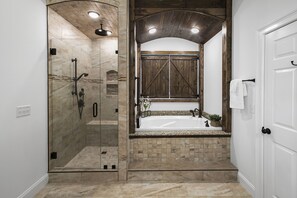 Combined shower/tub, hair dryer, towels, soap