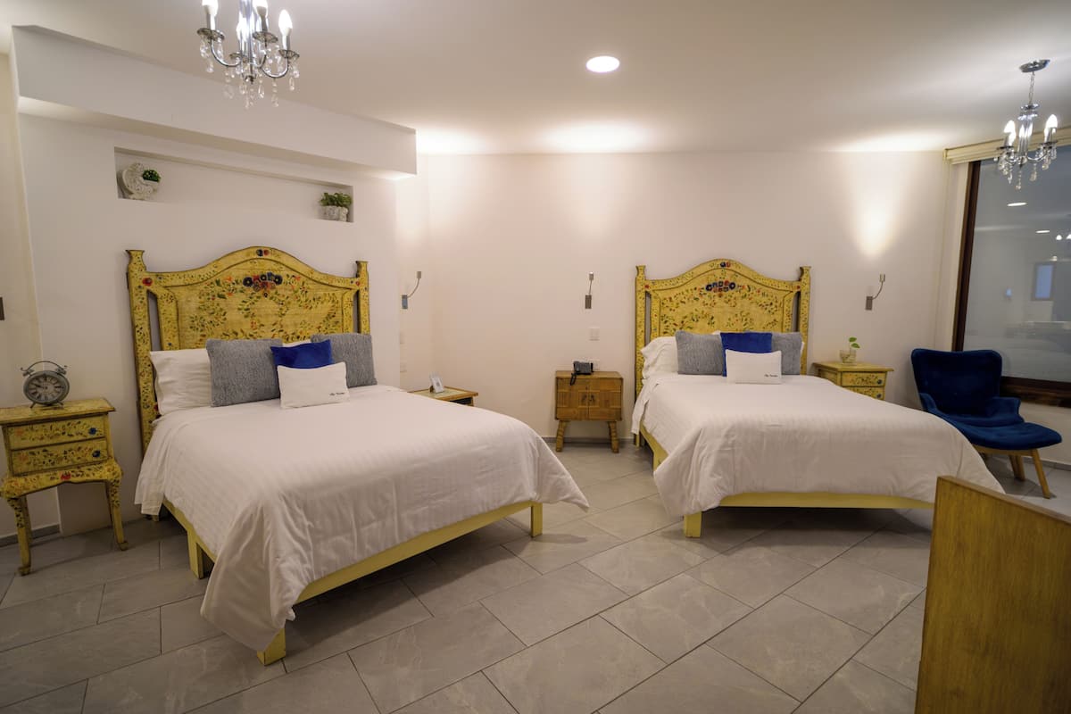 Elite Suite, Accessible (San Gimignano) | Sengetøy av topp kvalitet, senger med overmadrass og safe på rommet