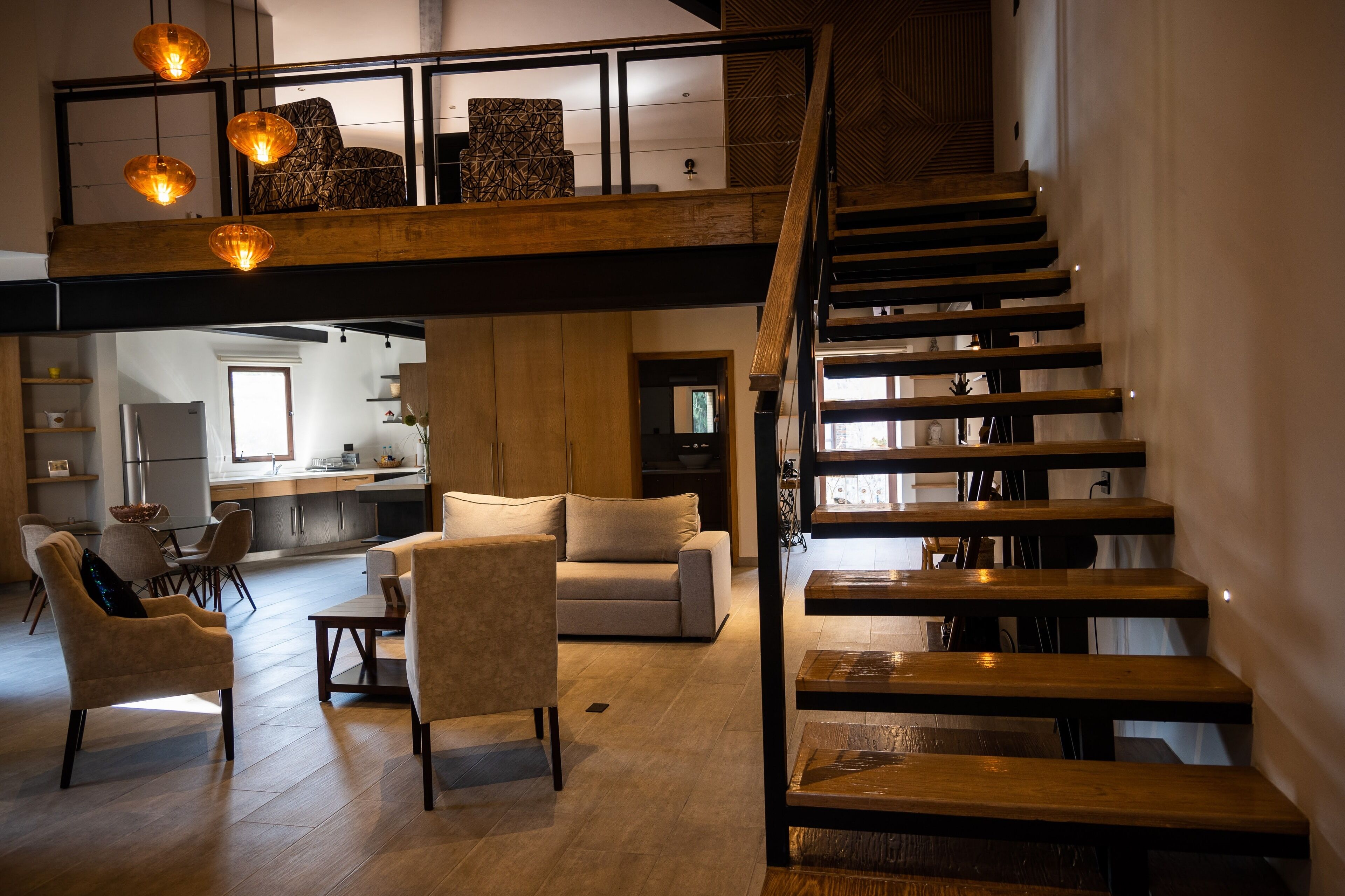 elite loft (volterra) | living area | 55-inch smart tv with satellite channels, tv