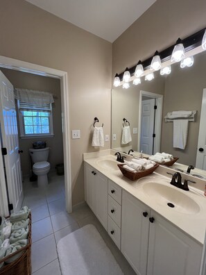 Shower, jetted tub, towels, soap