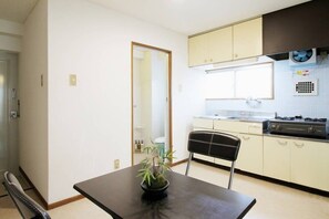 Fridge, microwave, stovetop, cookware/dishes/utensils