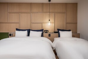 Habitación Premium con 2 camas individuales | Ropa de cama de alta calidad, minibar, escritorio y insonorización 