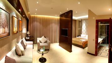 Chambre Deluxe | 1 chambre, minibar, coffres-forts dans les chambres, bureau