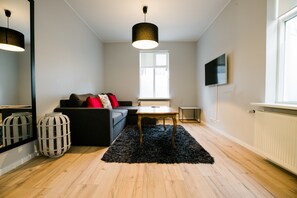 Deluxe-Apartment, 1 Schlafzimmer (Sigyn) | Bügeleisen/Bügelbrett, kostenlose Babybetten, kostenloses WLAN