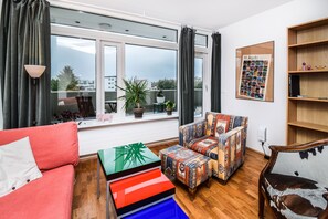 Departamento urbano, 1 habitación | Área de sala de estar