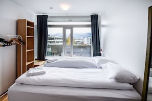 Departamento urbano, 1 habitación | 1 habitación, espacio para trabajar con laptop, cunas y wifi gratis