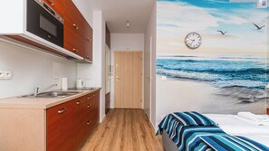Studiosuite (3) | Eigene Küche | Kühlschrank, Mikrowelle, Herdplatte, Geschirrspüler