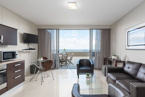 Classic Apartment, 2 Bedrooms | Living area | 32-inch flat-screen TV with satellite channels, TV - Infinity G4 (Cape Town)