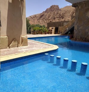 Outdoor pool, pool umbrellas, sun loungers