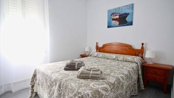 2 dormitorios, tabla de planchar con plancha, wifi y ropa de cama