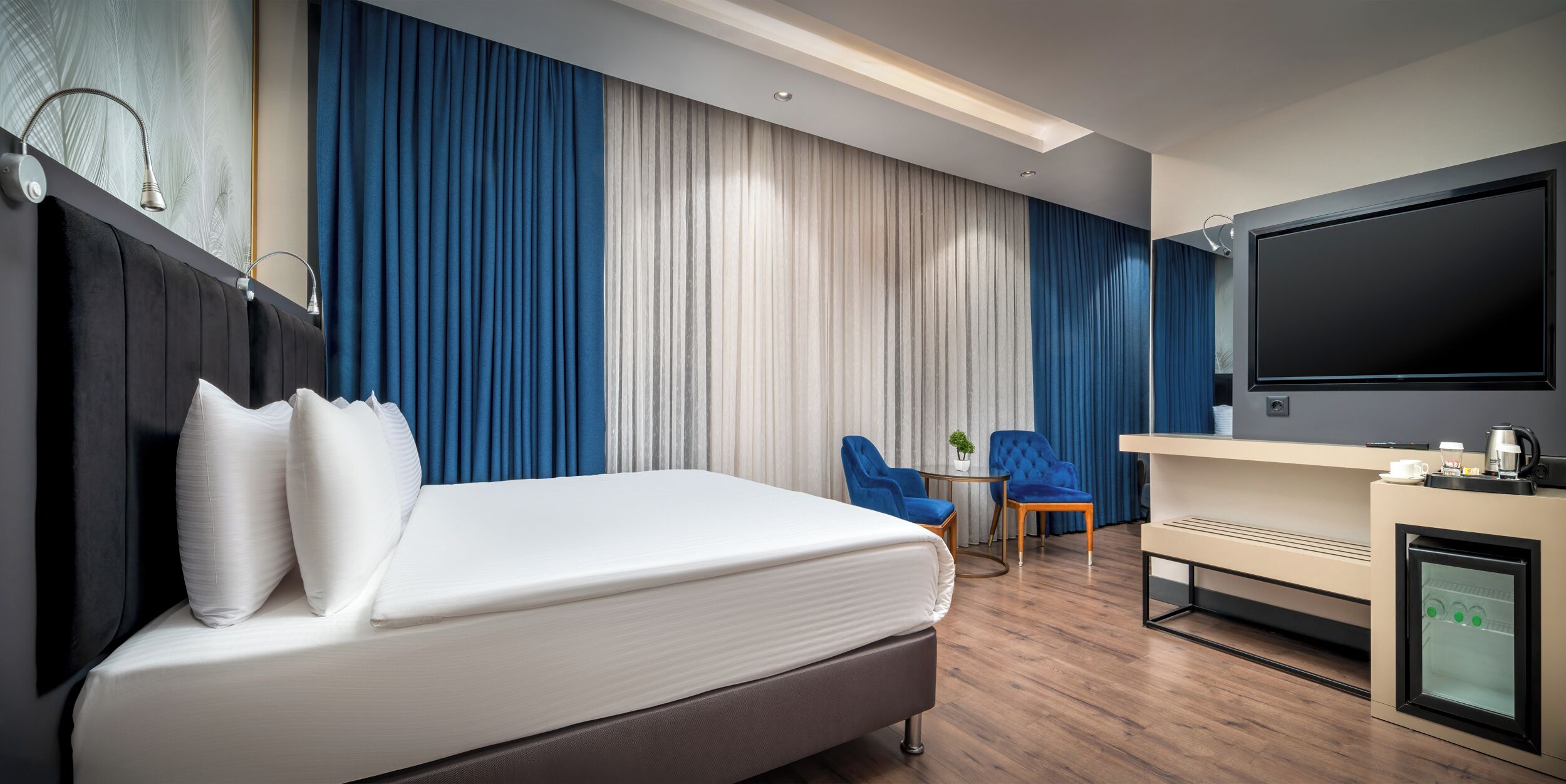 ห้องจูเนียร์สวีท, เตียงใหญ่ 2 เตียง, ปลอดบุหรี่ | ผ้าปูที่นอนฝ้ายอียิปต์, เครื่องน อนระดับพรีเมียม, เตียง Select Comfort