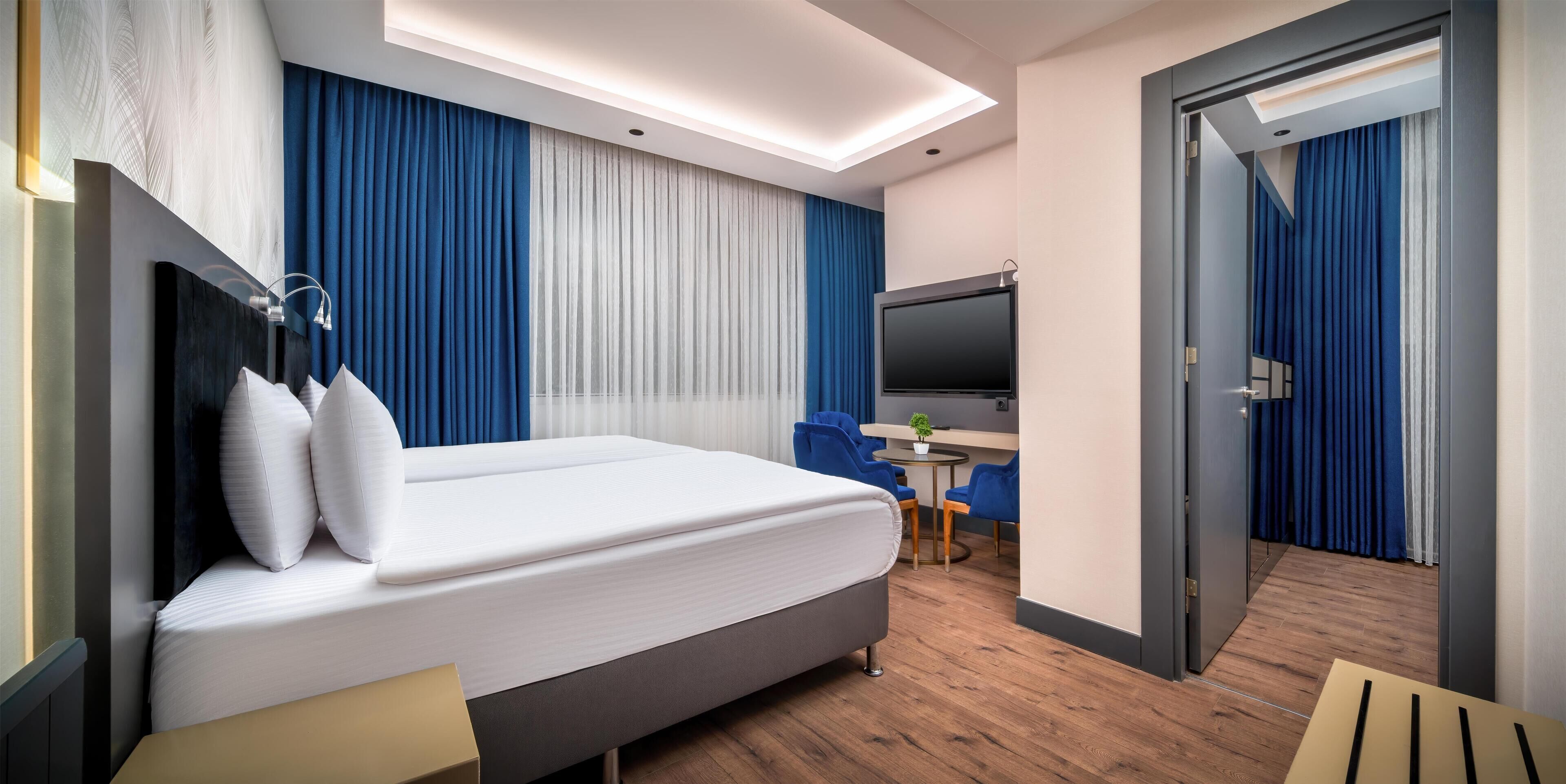 Chambre Deluxe, plusieurs lits, non-fumeurs | Draps en coton égyptien, literie de qualité supérieure