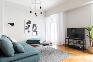 Apartment | Living area | 43-inch Smart TV with satellite channels, TV, Netflix - UPSTREET Acropolis Core Bright Modern Apt (Athens)