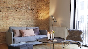 Deluxe-stúdíósvíta - 1 svefnherbergi - reyklaust | Stofa | Flatskjársjónvarp
