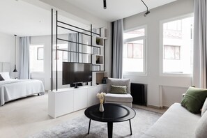 Apartment, 1 Bedroom (A) | Living area | 43-inch Smart TV with satellite channels, TV, Netflix - UPSTREET Luxury Apartments in Plaka (Athens)