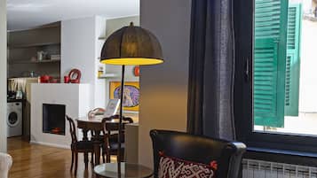 Apartment, 3 Bedrooms | Living area | Flat-screen TV, fireplace