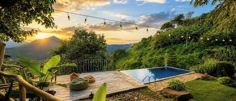 Outdoor pool, open 6:00 AM to 10:00 PM, sun loungers