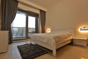 Apartment, 1 Bedroom | 1 bedroom, in-room safe, desk, iron/ironing board - Sparkle Tower Residence (Dubai)