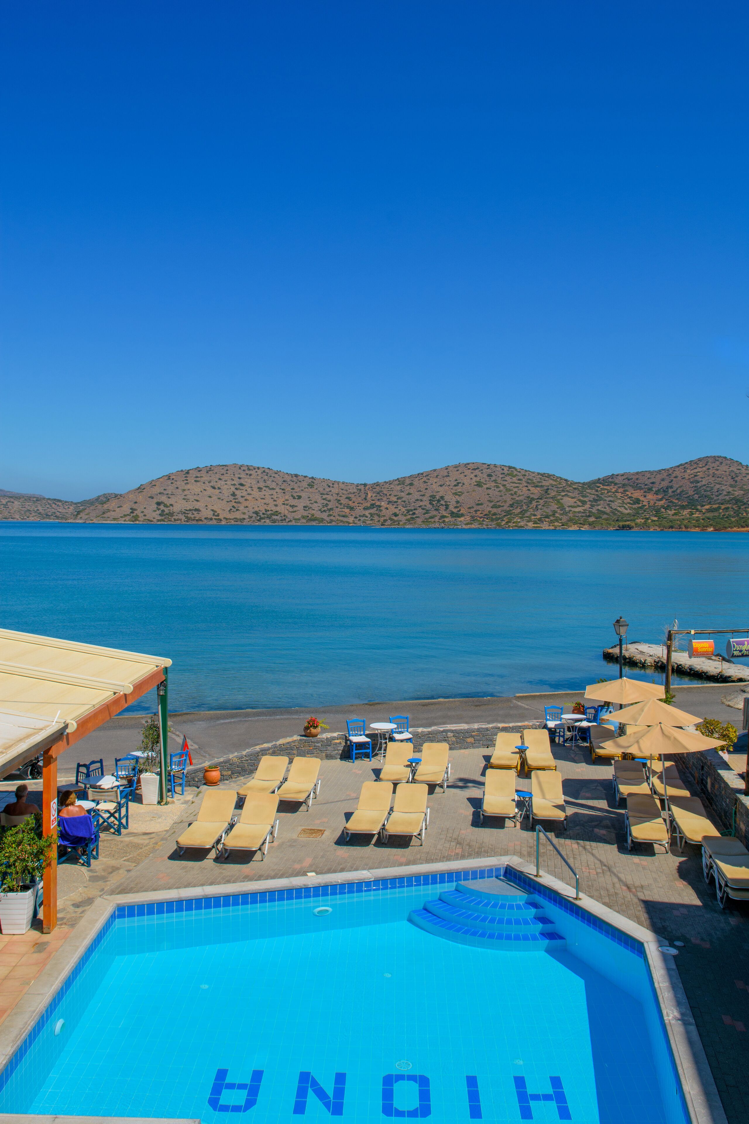 Seasonal outdoor pool, pool umbrellas, sun loungers