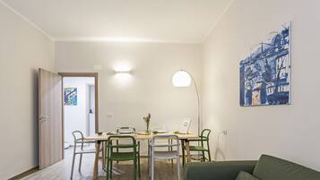 Apartment, 2 Bedrooms (Basilico) | Living area | Flat-screen TV