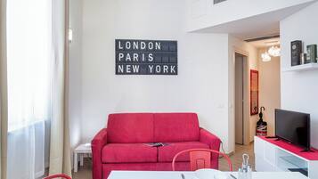 Apartment, 1 Bedroom | Living area | Flat-screen TV