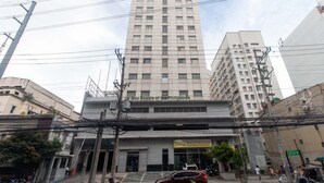 A multi-story building with a sign for "Boy Scouts of the Philippines" on the ground floor. - RedDoorz near SM Manila (Manila)