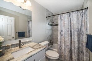 Combined shower/bathtub, hair dryer, towels, soap - Fully Furnished W / All Utilities (Clearwater)