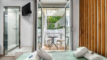 Deluxe Triple Room, Multiple Beds, Balcony (8) | Terrace/patio
