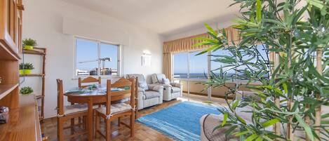 Apartment, 2 Bedrooms, Balcony | Living room | Flat-screen TV