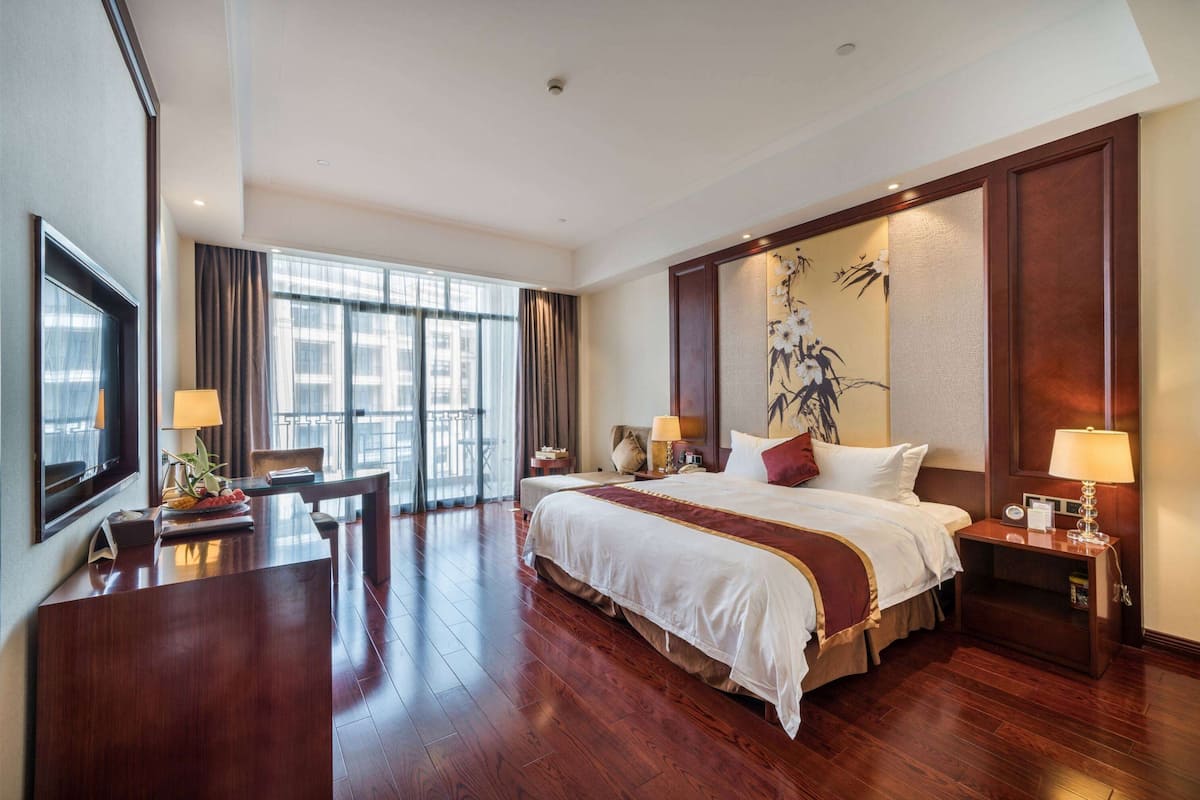 Chambre Deluxe, 1 très grand lit, fumeur