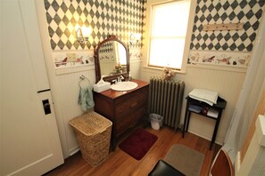 Shower, hair dryer, towels, toilet paper