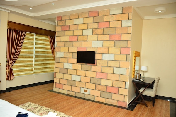 Desk, laptop workspace, free WiFi, bed sheets