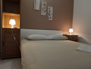 2 quartos, acesso à internet, roupa de cama