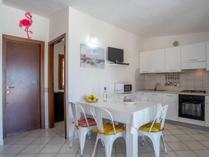 Fridge, microwave, oven, cookware/dishes/utensils - Flamingo by Interhome (Porto Istana)