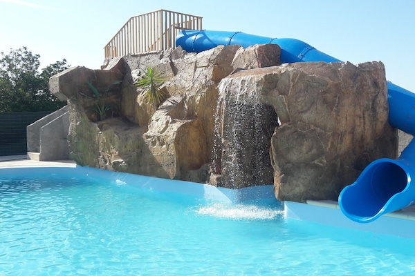 Outdoor pool, open 8:00 AM to midnight, sun loungers
