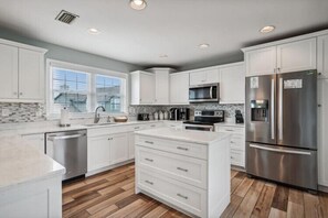 Coffee/tea maker, fridge, microwave, oven