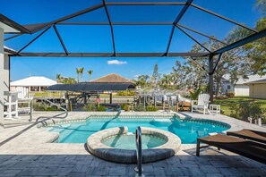 Outdoor pool, a heated pool - Winter Special, Beautiful Pelican Gulf Access Waterfront Home With Private Pool (Cape Coral)