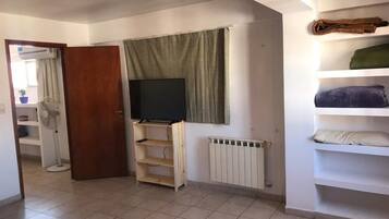 Apartment, 1 Bedroom | Living area | 32-inch flat-screen TV with cable channels, TV