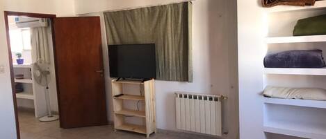 Apartment, 1 Bedroom | Living area | 32-inch flat-screen TV with cable channels, TV