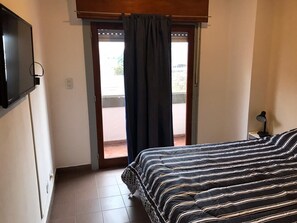 Departamento, 1 habitación | 1 habitación, tabla de planchar con plancha, wifi gratis y ropa de cama 