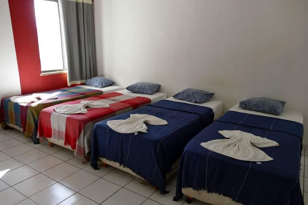Basic Quadruple Room | Minibar, laptop workspace, free WiFi, bed sheets